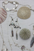 Eclipse drop earrings