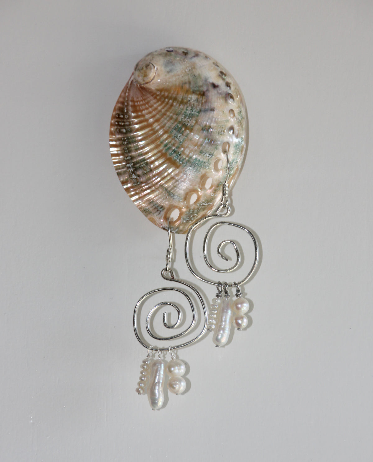Whirl charm earrings